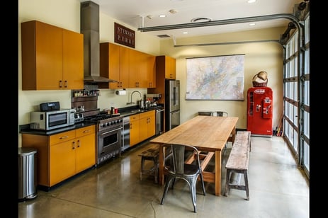 Stewart Perry Construction - kitchen with aluminum and glass sectional doors